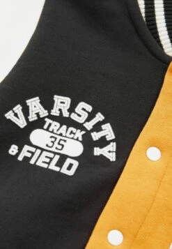 Next Varsity - Chaquetas Bomber - Yellow Black -Ropa Ventas 7746a4d04e7046d787cf374bd52b82cd